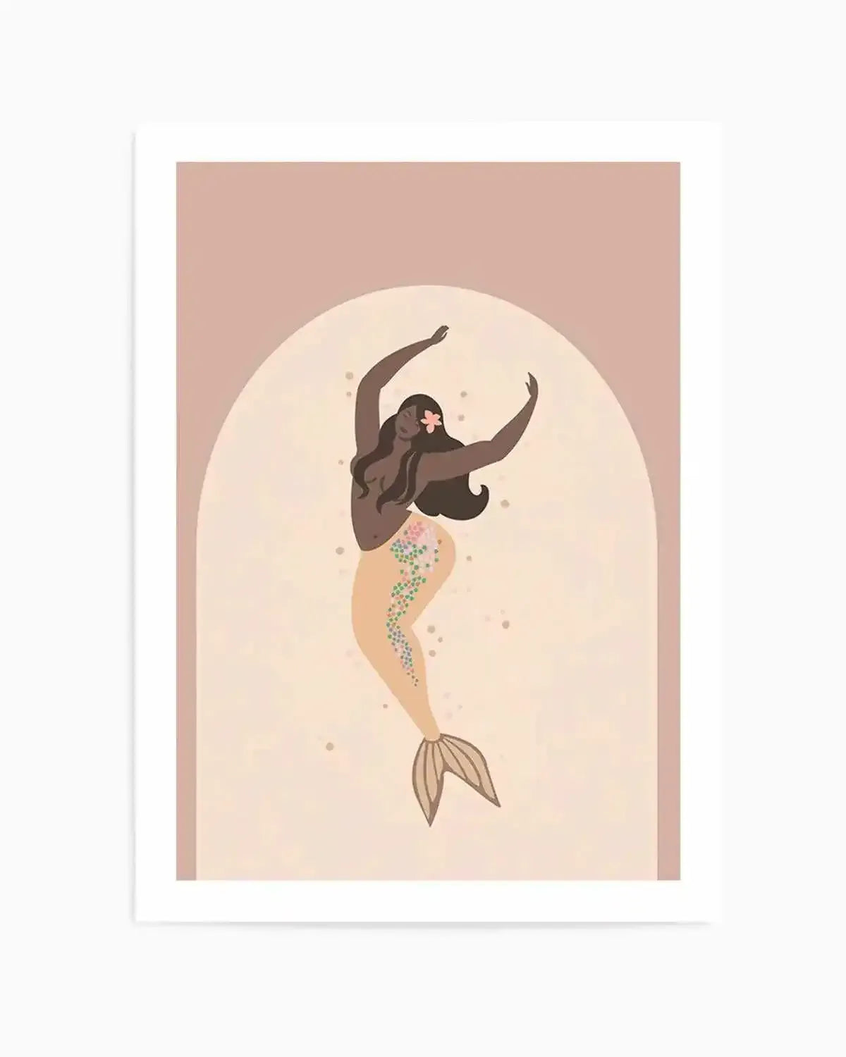 Illustration art print featuring a dark-skinned mermaid with long dark hair and a pink flower tucked behind her ear, dancing with arms raised. Her tail is a light peach colour with scattered pink, green, and yellow floral details and small brown speckles. The mermaid is set against a light cream arched background, framed by a soft blush pink border.