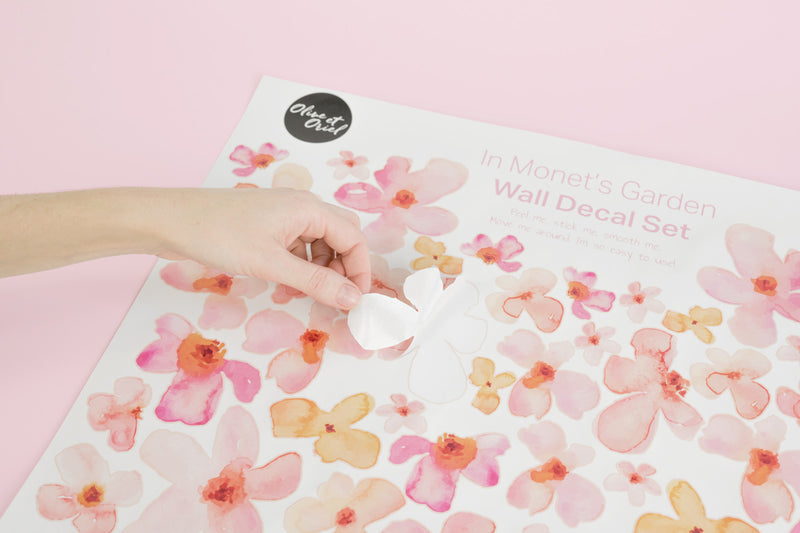How to order wall decals with Olive et Oriel. Pink flower decals in image.
