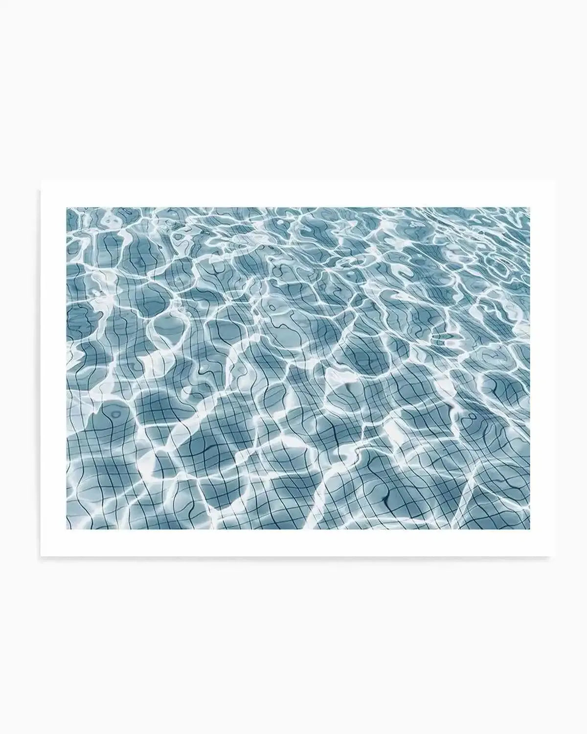Product shot art print of a swimming pool with light blue water and a tiled bottom, showing the distorted grid pattern of the tiles through the rippling surface. The sunlight creates bright, dancing reflections on the water.