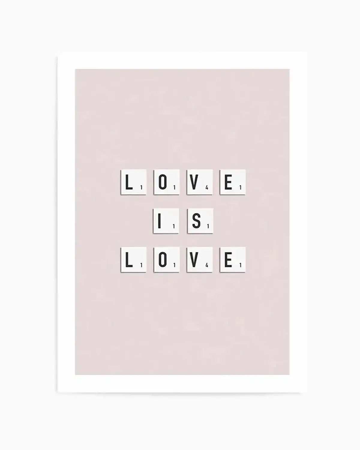Art print featuring the phrase "LOVE IS LOVE" spelled out in white Scrabble-style letter tiles with black letters and point values, arranged in three rows on a soft blush pink background, with a white frame and white border.