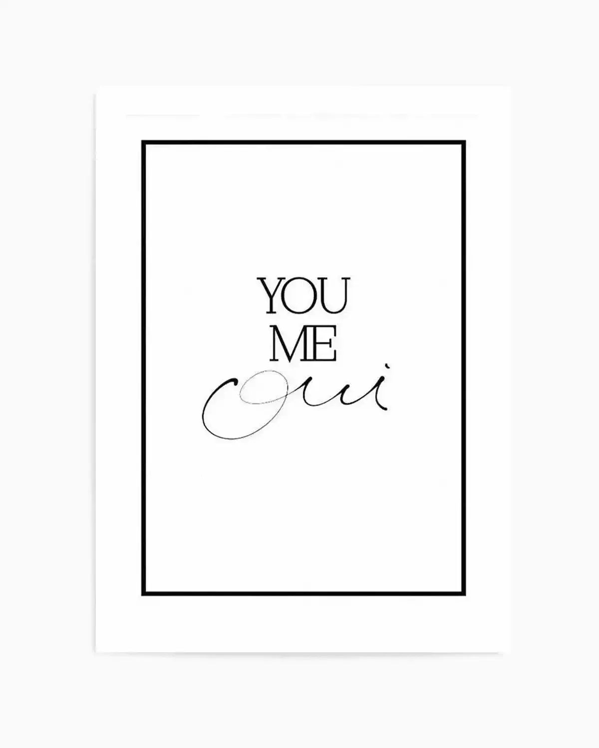 Art print featuring hand-scripted text reading "YOU ME oui" in black ink on a white background, enclosed within a black rectangular border. The words are arranged vertically with "YOU" and "ME" in a clean sans-serif typeface, while "oui" is written in an elegant flowing script style below. The composition is centered and minimalist with ample white space surrounding the text.