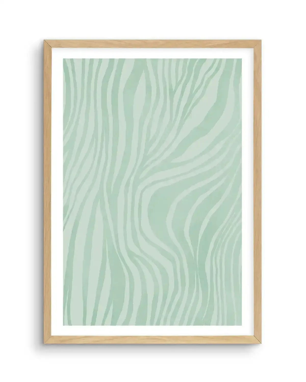 Abstract art print featuring a repeating pattern of organic, wavy lines in a soft, muted sage green against a lighter, pale mint green background, displayed in a natural oak frame with white border.