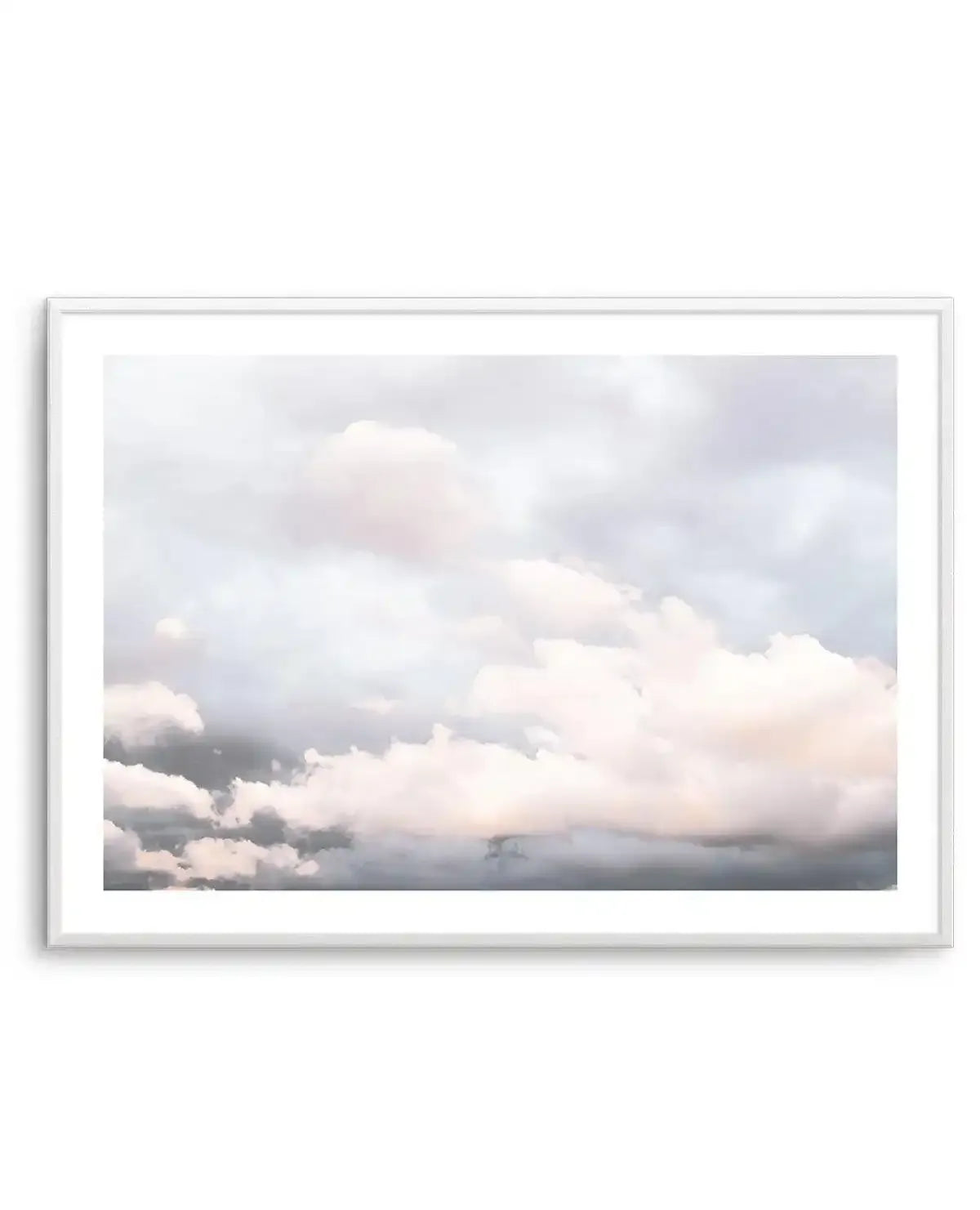 Framed art print featuring a cloudy sky with soft, muted tones. The composition shows layers of clouds in shades of pale grey, white, and subtle hints of blush pink and light blue, creating a serene and ethereal atmosphere, displayed in a white frame with white border.