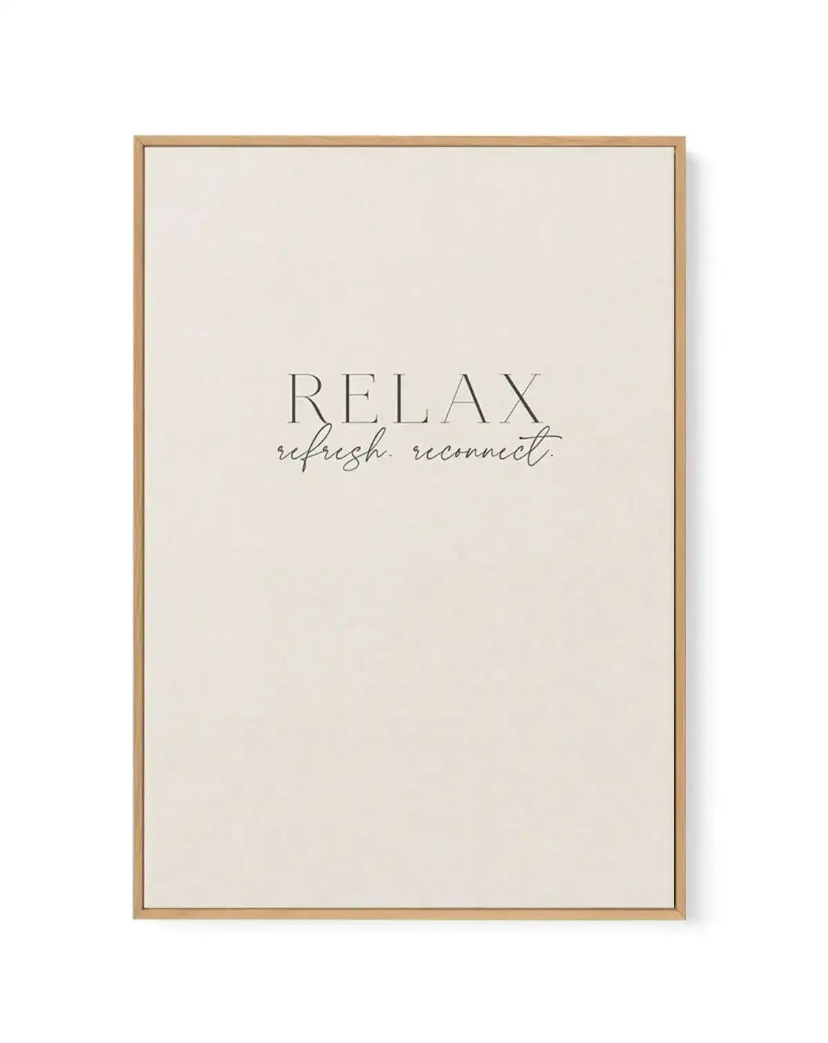 Framed canvas art print with natural wood frame displaying centered text in a minimalist design. The background is cream-colored with subtle texture. Text reads "RELAX" in thin capital letters, followed by "refresh. reconnect." in flowing cursive script below. The overall composition is centered and simple, evoking a calm, wellness-focused aesthetic.
