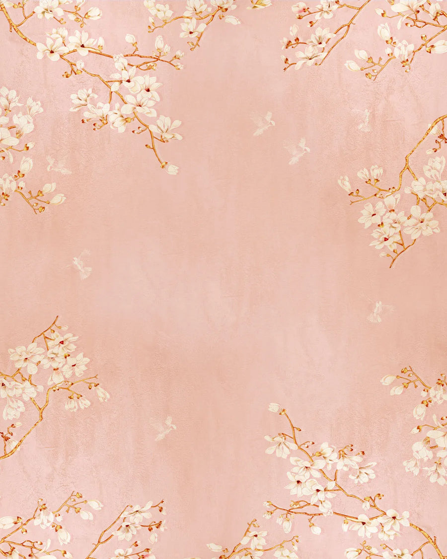 Chinoiserie Birds in Blossom wallpaper featuring delicate white and cream flowering branches with golden-brown stems scattered across a soft peachy-pink background. The botanical illustration style design shows small clusters of blossoms with subtle color variations and fine detail work against the muted rose-toned ground. Sprigs are distributed across all corners and edges with generous open space in the center, creating an elegant, airy composition with an artistic watercolor-like quality.