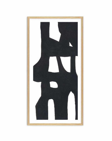Tall narrow black and white abstract print with bold organic shapes, with white border, in a natural wood frame