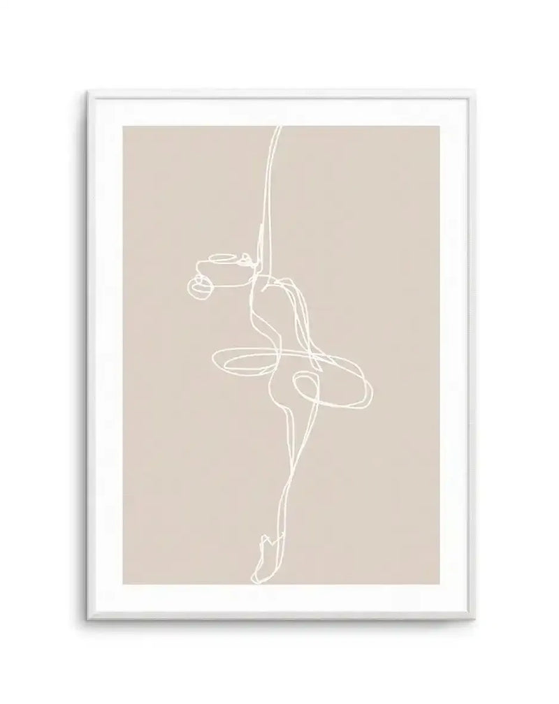 Abstract line drawing art print of a ballet dancer in a minimalist continuous line style. The figure is rendered in cream or off-white lines against a soft beige and pale pink gradient background. The dancer is shown mid-leap or in an arabesque position, with elongated limbs, pointed feet, and arms extended. The composition is vertical and centered. The artwork is framed in a thin silver or light gray frame with a white border surrounding the print.