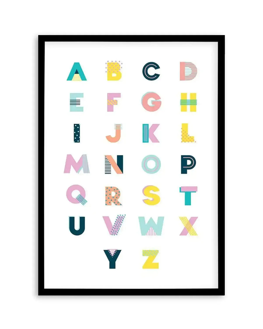 Art print featuring the full alphabet in uppercase letters, each with a unique geometric pattern and bright color scheme including teal, yellow, pink, and orange, displayed in a black frame with a white border.