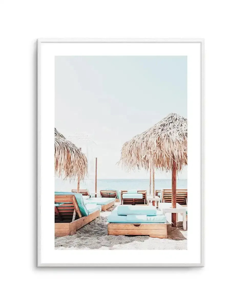 Aqua Sunlounges Art Print-Shop Greece Wall Art Prints Online with Olive et Oriel - Our collection of Greek Islands art prints offer unique wall art including blue domes of Santorini in Oia, mediterranean sea prints and incredible posters from Milos and other Greece landscape photography - this collection will add mediterranean blue to your home, perfect for updating the walls in coastal, beach house style. There is Greece art on canvas and extra large wall art with fast, free shipping across Aus