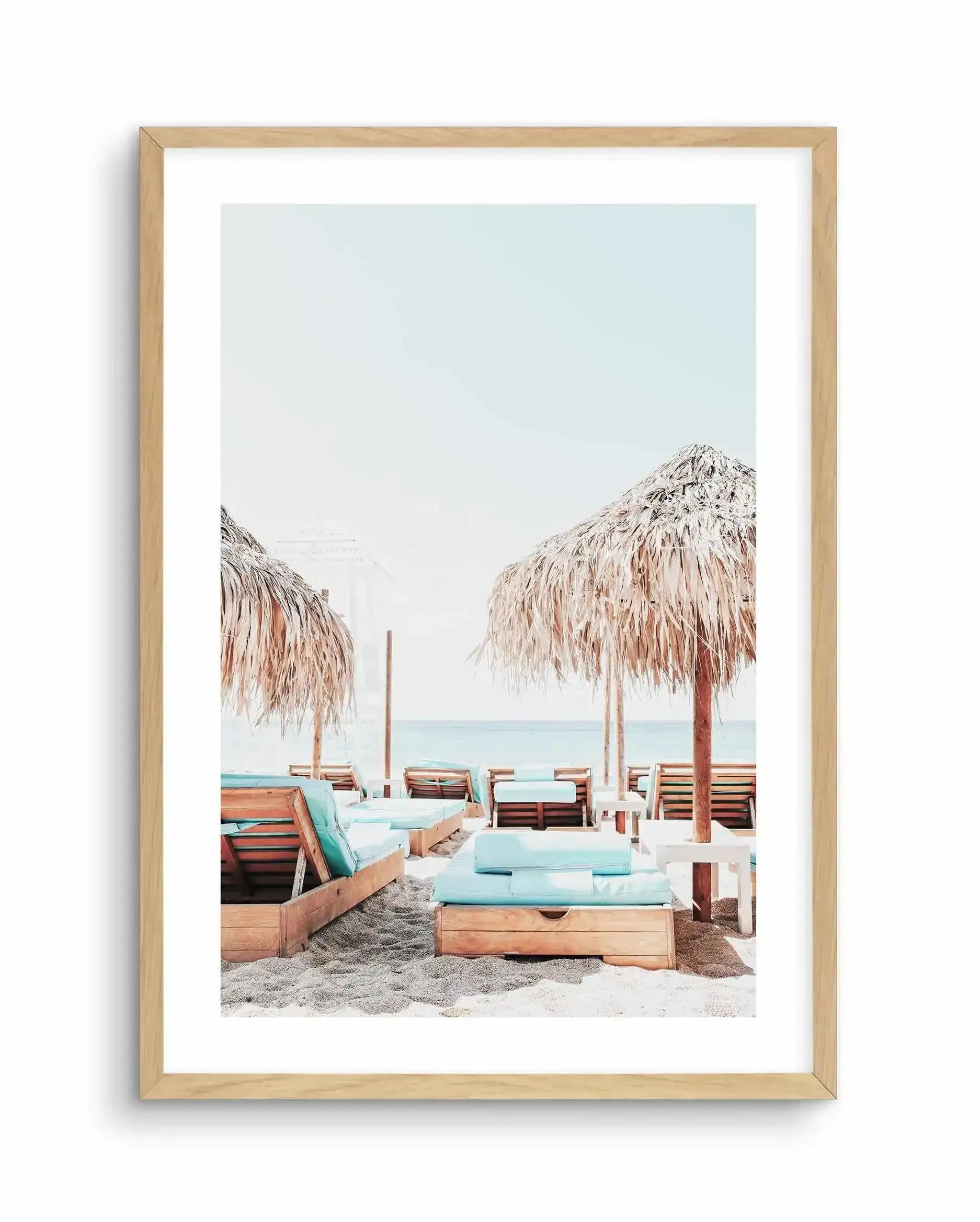 Aqua Sunlounges Art Print-Shop Greece Wall Art Prints Online with Olive et Oriel - Our collection of Greek Islands art prints offer unique wall art including blue domes of Santorini in Oia, mediterranean sea prints and incredible posters from Milos and other Greece landscape photography - this collection will add mediterranean blue to your home, perfect for updating the walls in coastal, beach house style. There is Greece art on canvas and extra large wall art with fast, free shipping across Aus