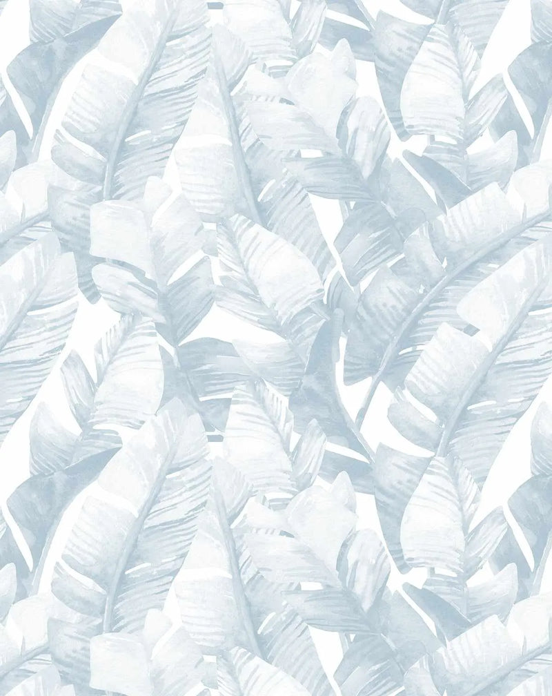 Peel and stick wallpaper featuring a repeating pattern of hand-painted banana leaf palms in muted Hamptons blue and soft grey on a white background. The botanical design has a loose, organic watercolour quality with visible brushstroke texture.