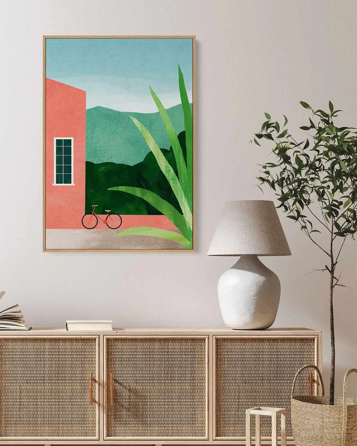 Bicycle & Pink House by Henry Rivers | Framed Canvas Art Print from Olive et Oriel where you can shop wallpaper and artworks online