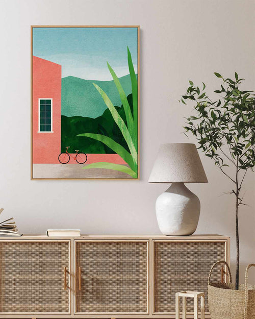 Bicycle & Pink House by Henry Rivers | Framed Canvas Art Print