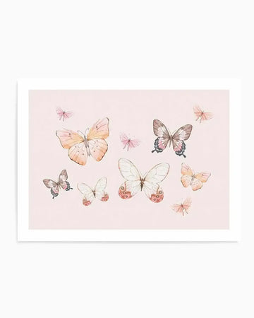 Watercolour art print featuring a collection of butterflies in various sizes and soft pastel colours on a pale pink background. The butterflies are depicted with delicate wings in shades of peach, dusty rose, cream, and muted brown, with some featuring subtle black outlines and small circular details on their wings.
