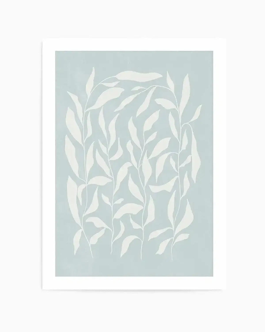 Art print featuring an illustration of several tall, slender plant stems with numerous elongated, oval-shaped leaves in a soft, muted white against a pale, dusty blue background. The composition shows the stems arranged vertically, with some leaves curving and overlapping, creating a gentle, organic pattern. The print is displayed with a clean white border.