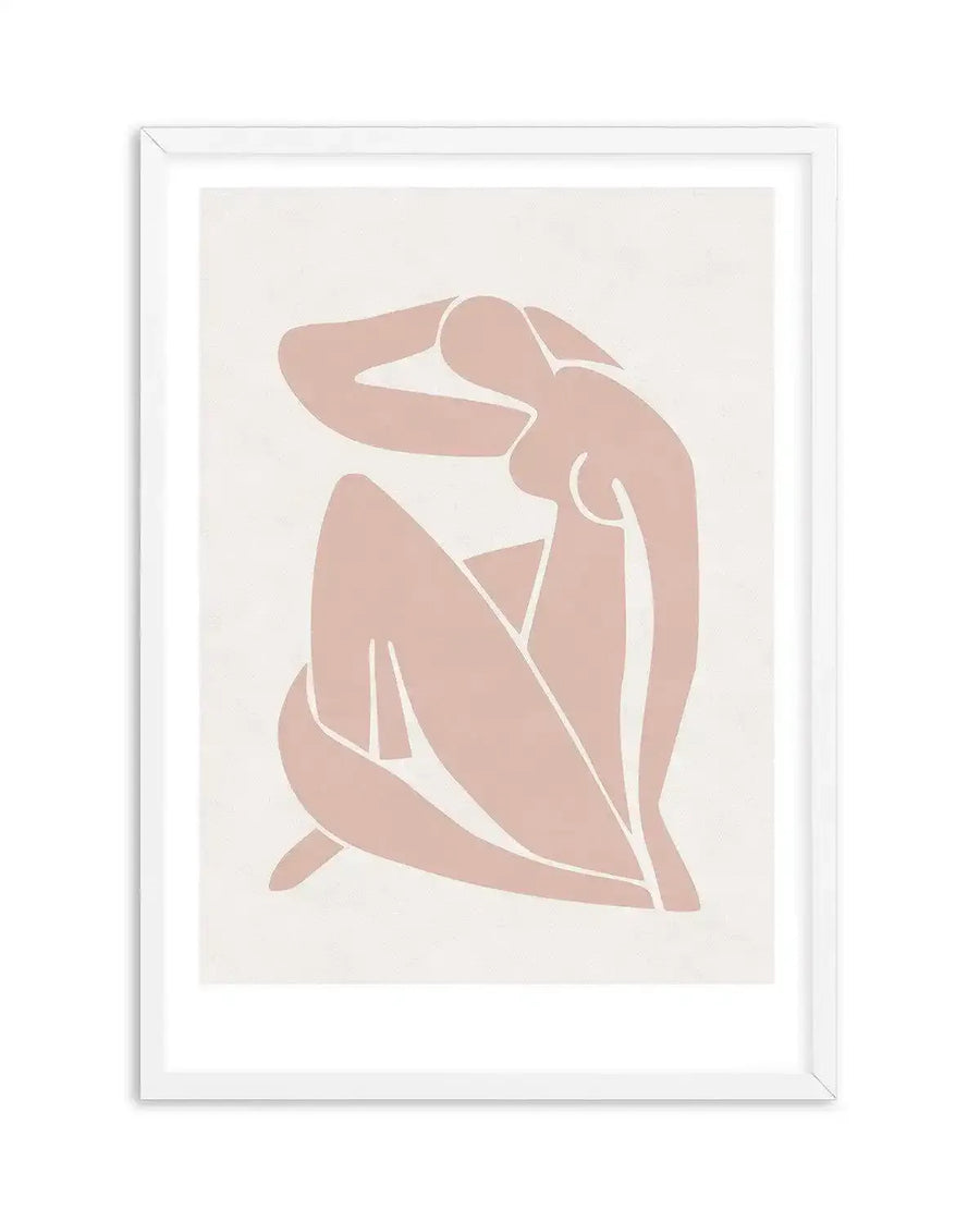 Art print featuring a minimalist, abstract illustration of a seated female figure in a pose with one arm raised to her head, rendered in a solid, muted blush pink against a textured off-white background, displayed in a white frame with a white border.