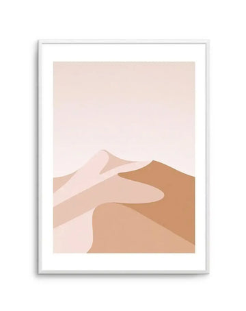 Minimalist art print featuring a desert landscape with rolling sand dunes in varying shades of warm beige, light peach, and soft brown against a pale cream sky, displayed in a white frame with white border.