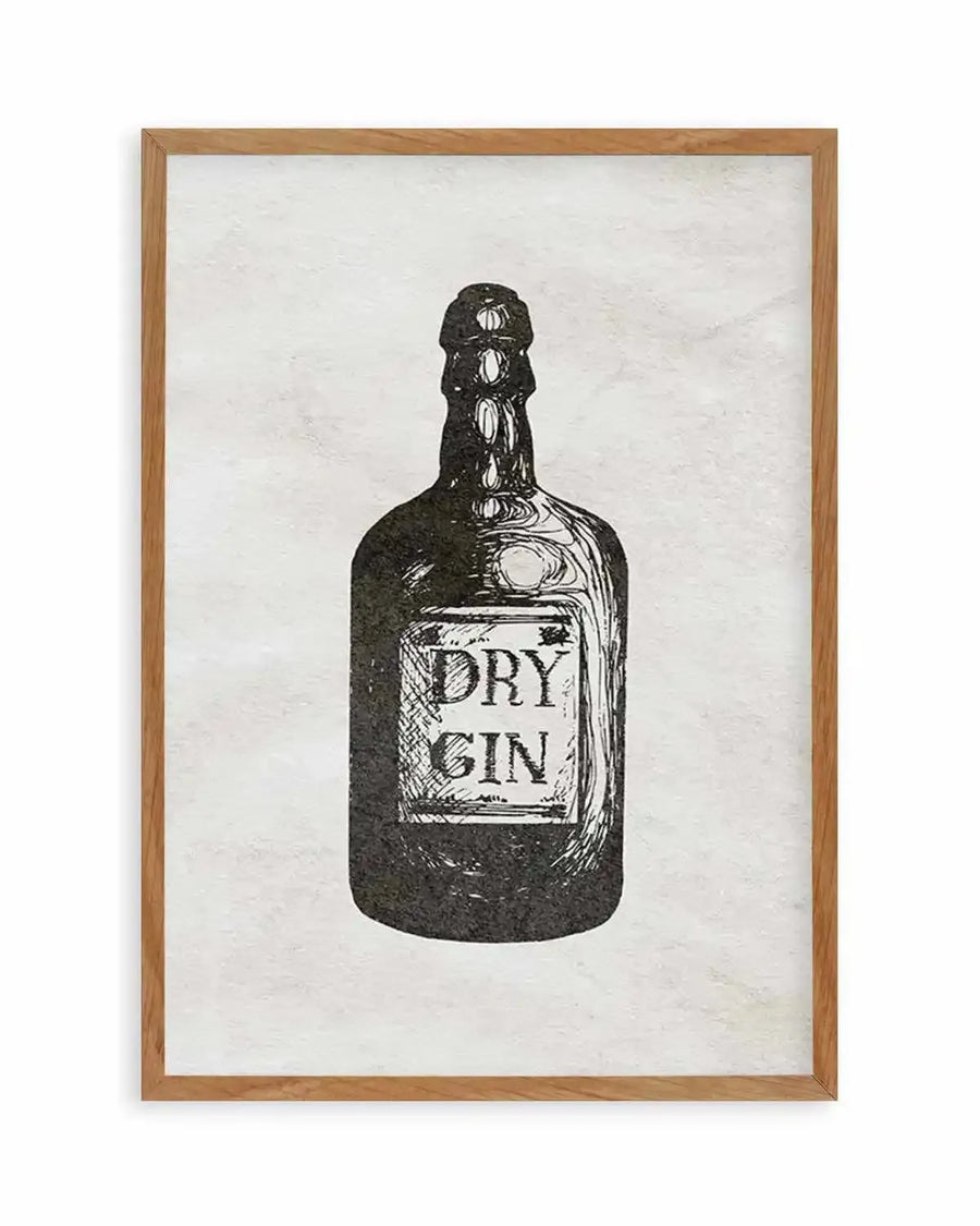 Art print featuring a black and white illustration of a vintage-style gin bottle with a label that reads "DRY GIN" in a rustic font, displayed in a natural oak frame with white border. The illustration has a textured, slightly distressed appearance against a light, subtly textured background.