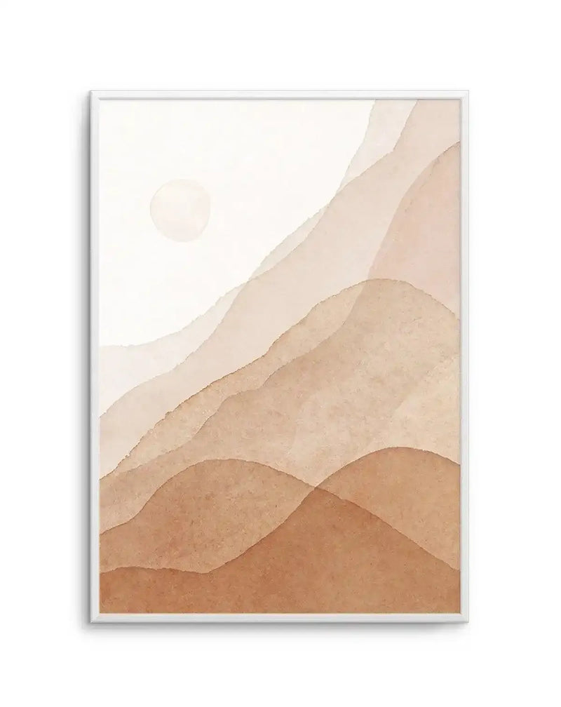 Abstract art print featuring a minimalist landscape of rolling hills and a sun in warm, earthy tones, with a white frame and white border. The composition uses layered, translucent watercolour washes in shades of terracotta, rust, and sandy beige to create a sense of depth and gentle undulation. A pale, circular sun is visible in the upper left, against a soft cream background.