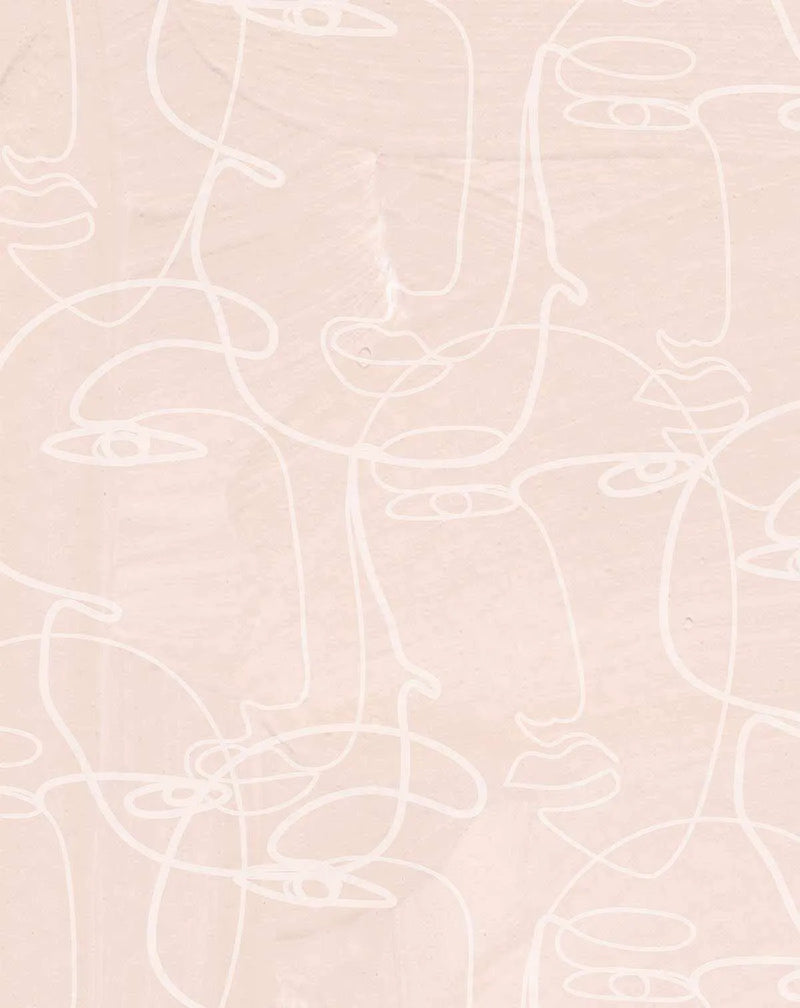 Peel and stick wallpaper featuring a repeating pattern of abstract faces drawn with continuous white lines on a textured, pale blush pink background. The minimalist line art creates a subtle, organic design with a hand-drawn quality.