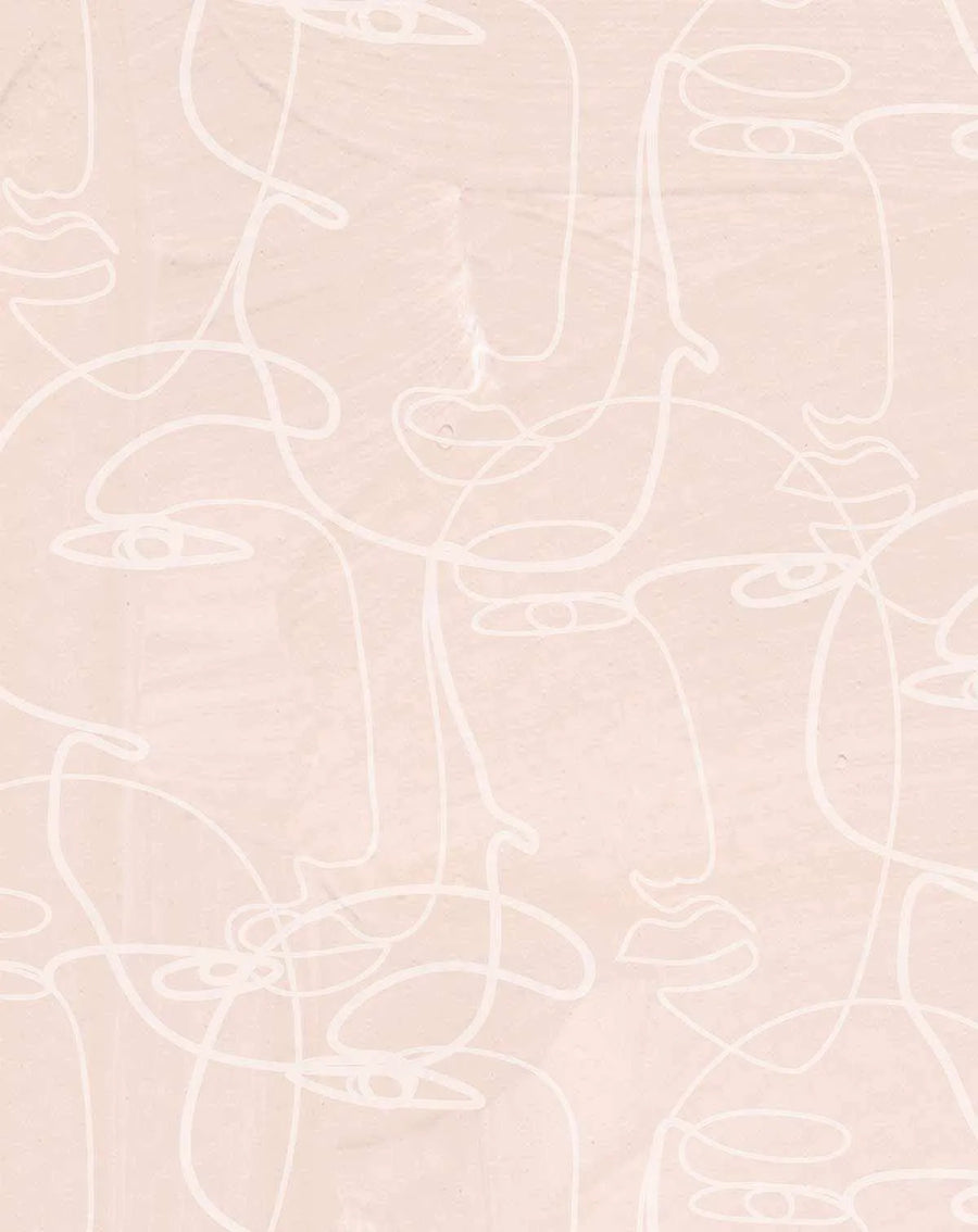 Peel and stick wallpaper featuring a repeating pattern of abstract faces drawn with continuous white lines on a textured, pale blush pink background. The minimalist line art creates a subtle, organic design with a hand-drawn quality.
