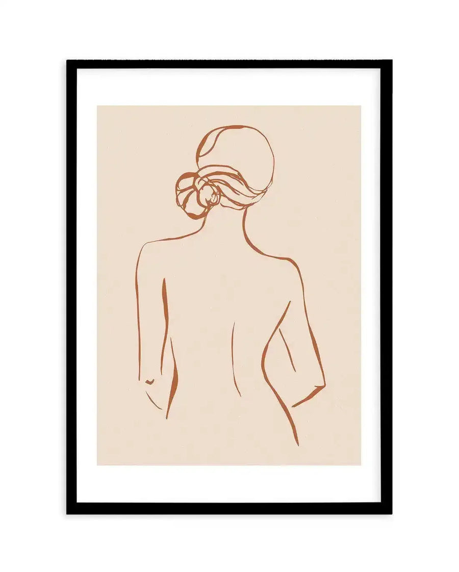 Line art print featuring the back of a female form with hair tied in a bun, drawn with a single continuous terracotta-coloured line on a cream background, displayed in a black frame with a white border.