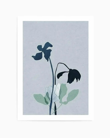 Minimalist watercolor art print featuring two wilted flowers with dark blue-black petals against a soft gray-blue background. The composition includes graceful curved stems in dark blue-gray and pale green-tinted leaves with translucent watercolor texture. The artwork is presented in a white border frame, creating a clean, contemporary aesthetic with muted, sophisticated color palette emphasizing the delicate nature of the botanical subjects.