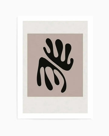 Abstract art print featuring two organic, blob-like shapes in solid black, one above the other and slightly offset, on a muted taupe background. The shapes have rounded edges and a fluid, almost ink-blot quality, printed on fine art paper and displayed in a white frame with white border.
