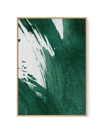 Framed canvas art print featuring abstract paint splashes in forest green and white. The composition shows dynamic brushstrokes and splatter marks against a textured deep green background, with white paint creating diagonal streaks and organic shapes across the upper left and center. Natural wood frame with white border. Vertical orientation.