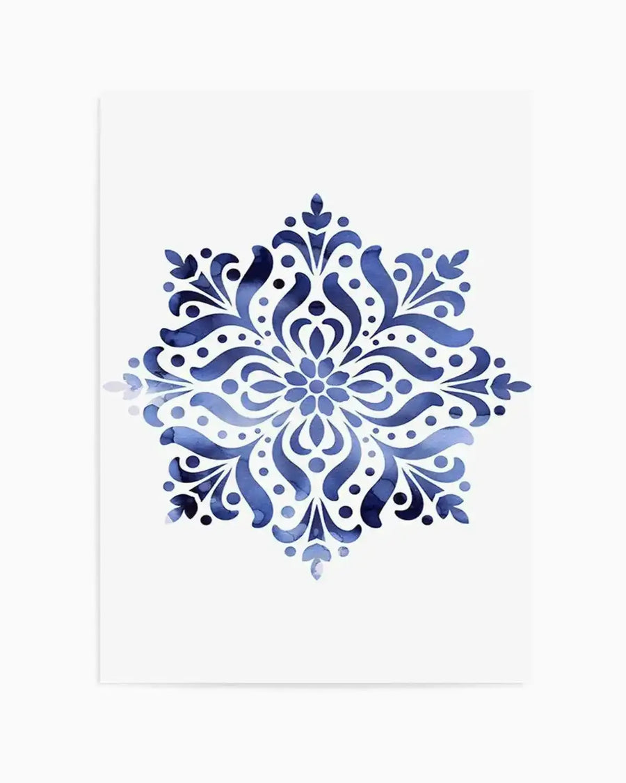Watercolour art print featuring a symmetrical mandala-like design in varying shades of blue, from deep indigo to pale sky blue, with visible brushstroke texture. The intricate pattern consists of swirling organic shapes, dots, and leaf-like motifs radiating outwards from a central floral element on a white background.