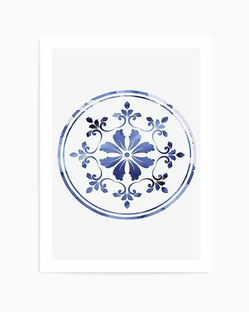 Watercolour art print featuring a circular motif of a stylized blue flower with six petals at its center, surrounded by intricate blue scrollwork and smaller floral elements, all enclosed within a double-lined circle with a mottled blue and white texture, printed on fine art paper.