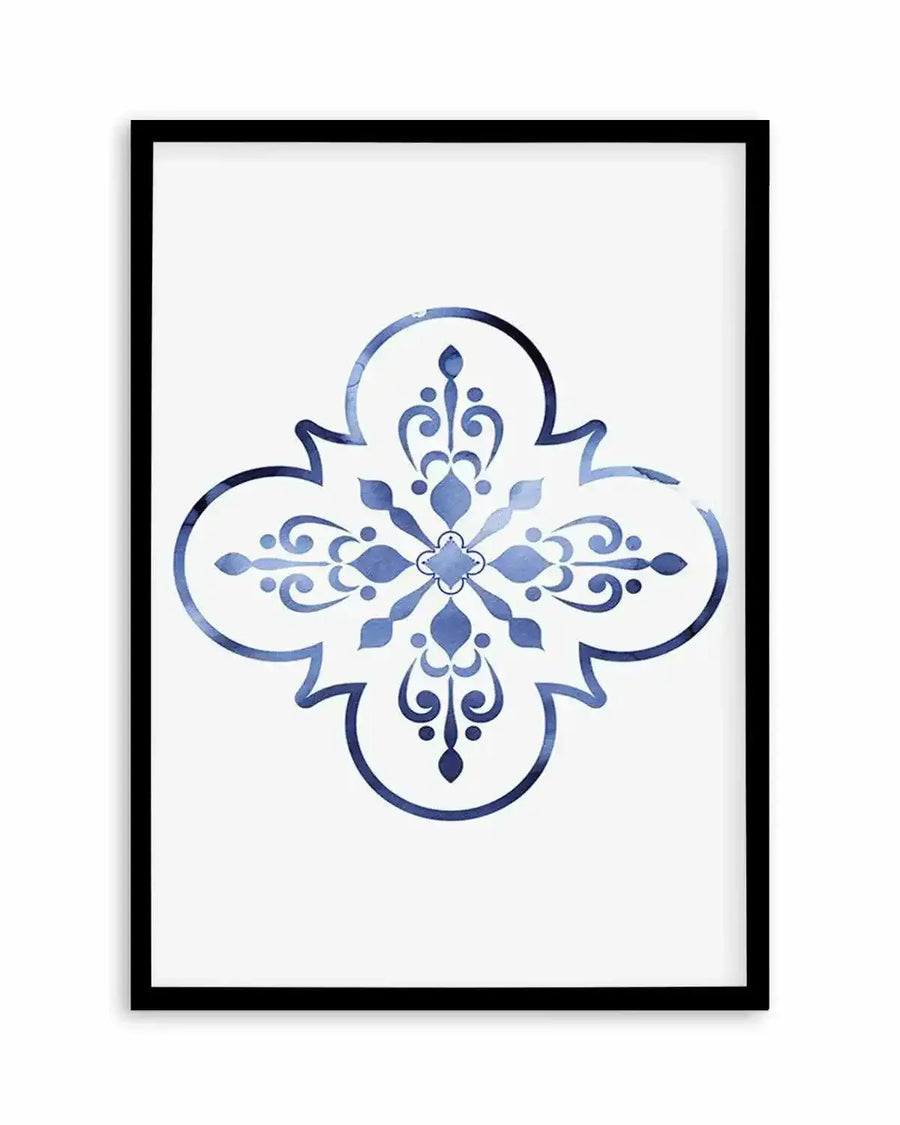 Watercolour art print featuring a symmetrical Moroccan tile-inspired motif in varying shades of blue, from deep indigo to pale sky blue, with a distressed, textured finish on a white background, displayed in a black frame with white border.