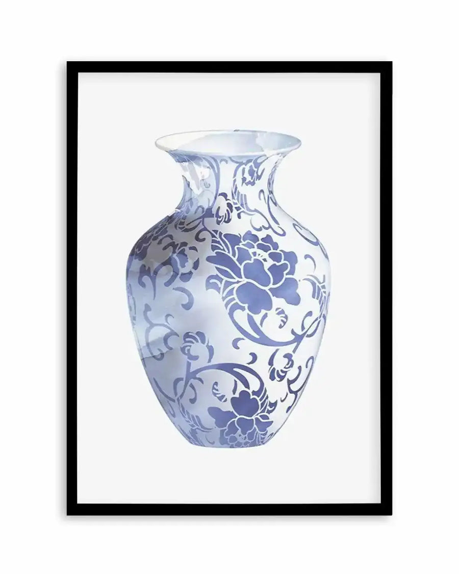 Art print featuring a pale blue and white vase with a traditional floral and scroll pattern in a darker periwinkle blue, displayed in a black frame with white border.