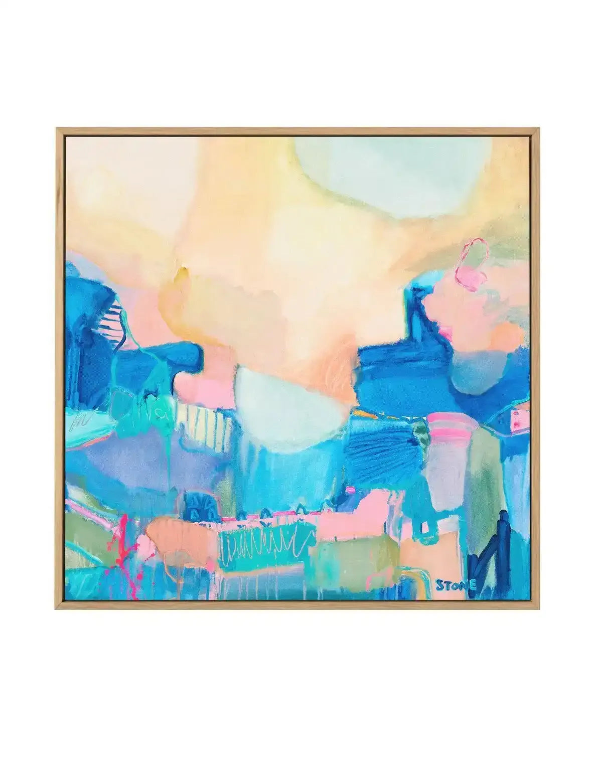 Abstract canvas print featuring a vibrant landscape of layered brushstrokes in shades of sky blue, teal, pastel pink, peach, and soft yellow, suggestive of a bright, sunny day over a town or city, displayed in a natural oak frame.