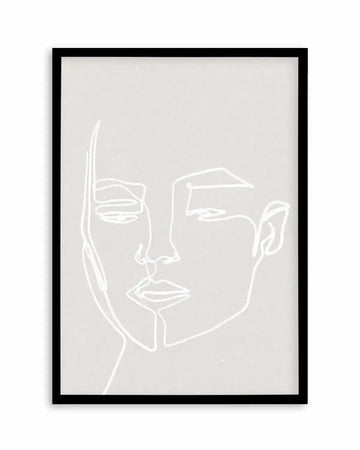 Line art print featuring a minimalist illustration of a woman's face in white lines on a light grey, textured background, displayed in a black frame with a white border. The face is composed of continuous, flowing lines, depicting the profile of the nose, lips, and chin, with abstract shapes for the eyes and ears.