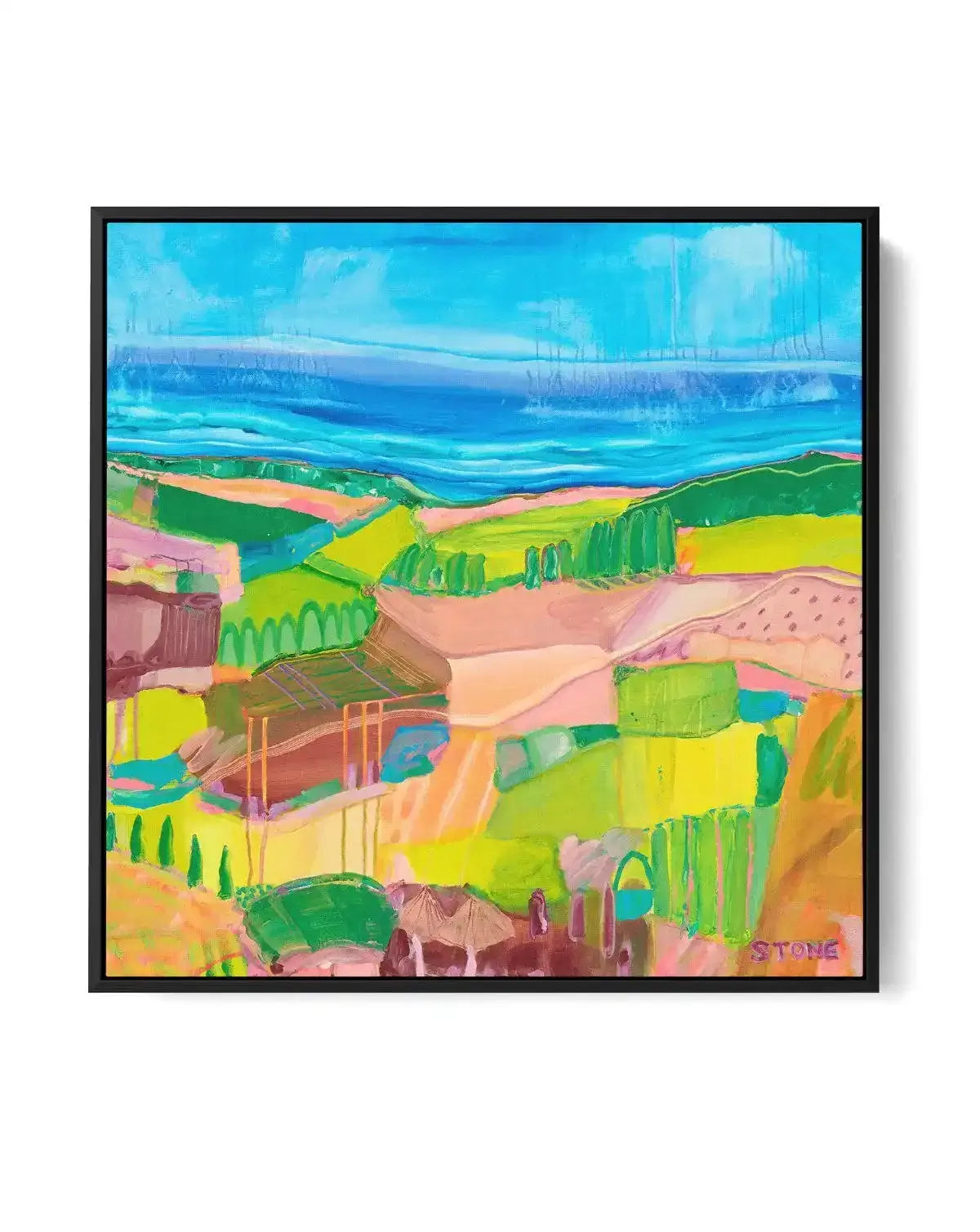 Abstract canvas print featuring a vibrant, expressive landscape with broad brushstrokes in bright blues, greens, yellows, and pinks, depicting a coastal scene with rolling hills and distant ocean, displayed in a black frame.