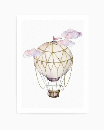 Watercolour art print featuring a whimsical hot air balloon in soft cream and pale purple hues, with delicate gold rope detailing and a small pink flag at the top, surrounded by fluffy pastel pink and purple clouds on a white background.