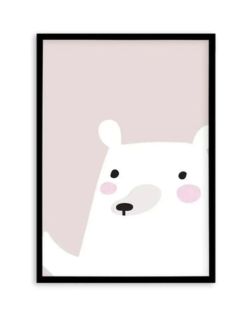 Framed art print featuring a minimalist illustration of a white bear's face against a soft mauve background. The bear has black dot eyes, a black nose, gray shading on one side of its snout, and pink circular cheeks. Two rounded ears protrude from the top of its head. The illustration has a simple, gentle style with clean lines and a calm expression. The artwork is displayed in a black frame with a white border.