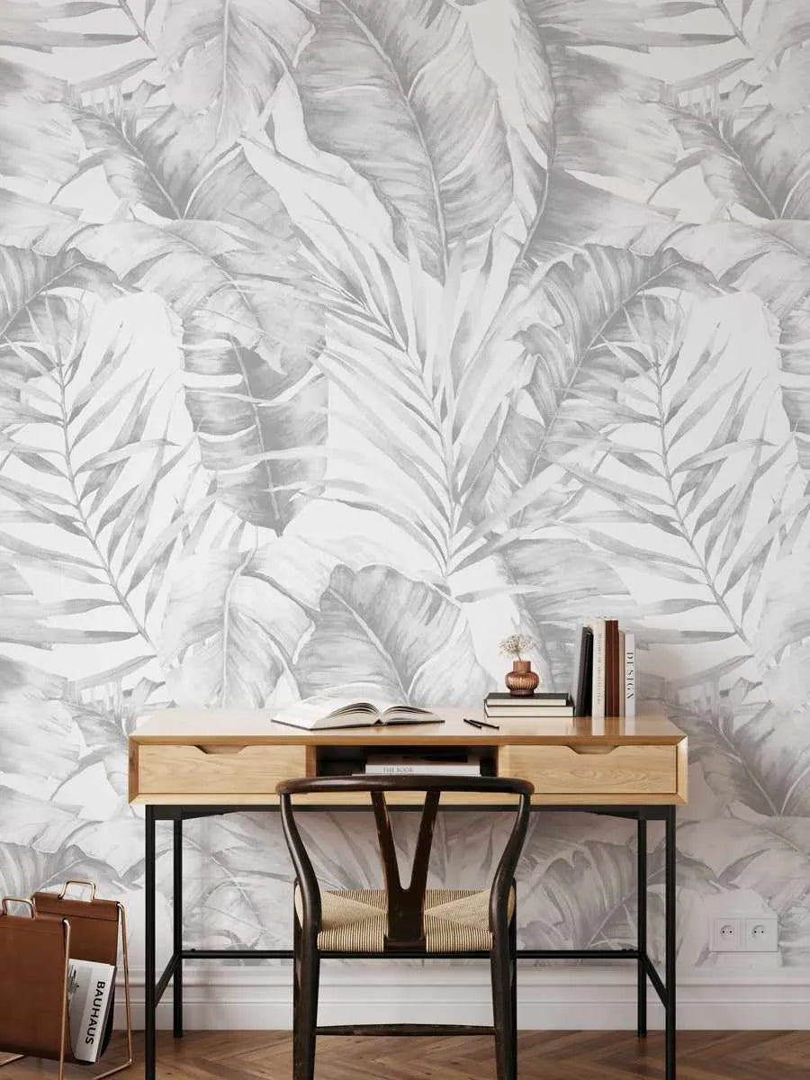 The best grey wallpaper online in 2025 is this stunning Palm Sanctuary wallpaper seen here in a home office setting. Textured grey linen-look wallpaper adding depth to a cozy bedroom, living room or dining interior.