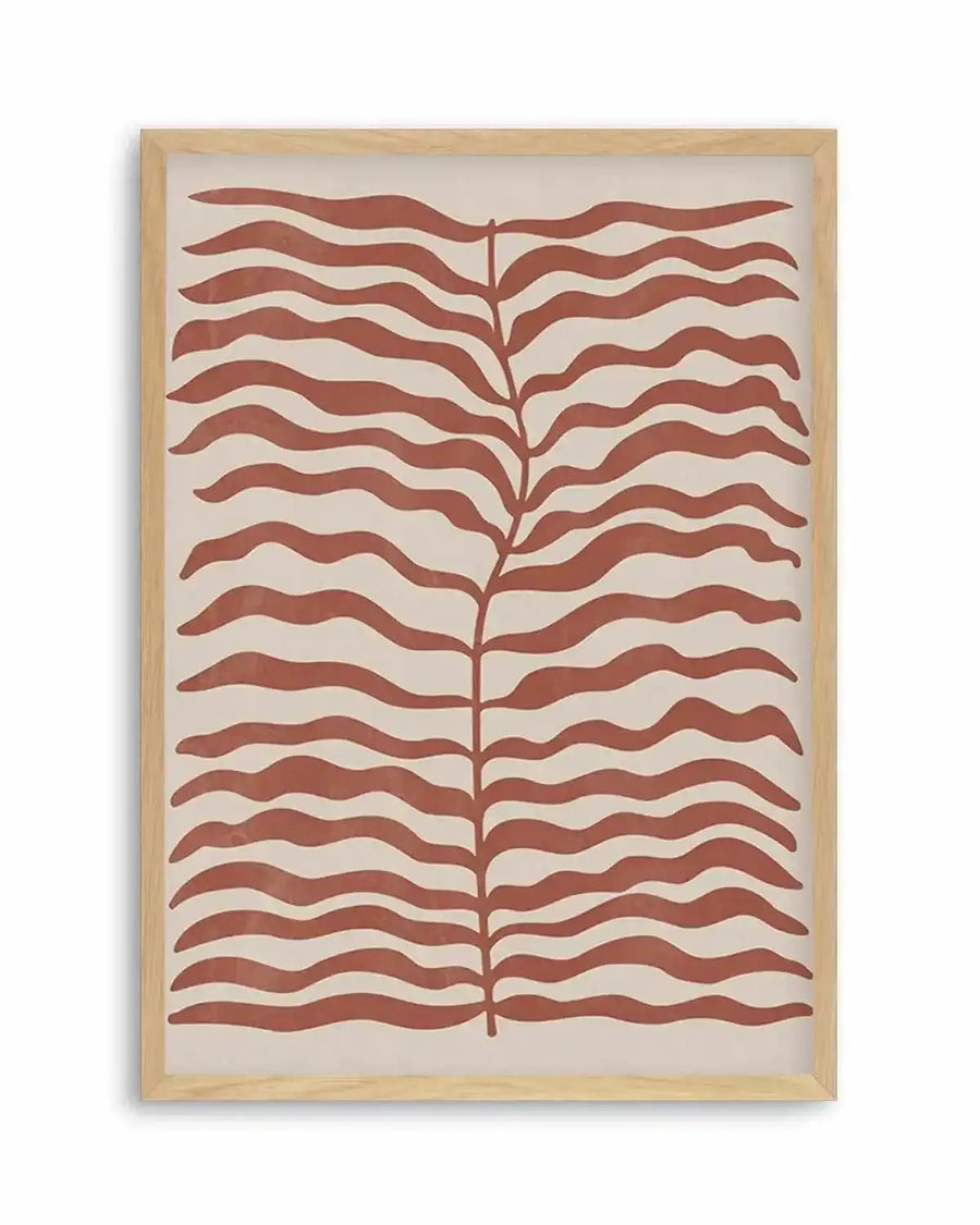 Art print featuring a central vertical stem with numerous horizontal, wavy, leaf-like forms extending outwards in a terracotta red hue against a light cream background, displayed in a natural oak frame with white border.