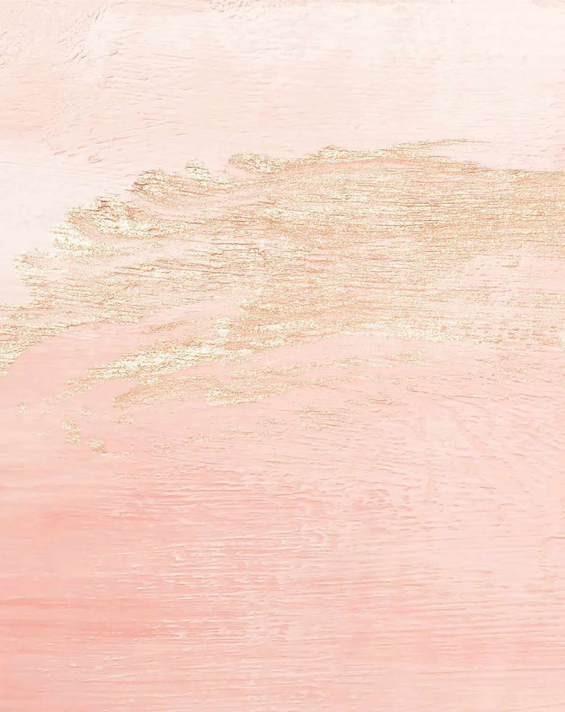 Peel and stick wallpaper featuring a hand-painted abstract design with a base of soft blush pink and a horizontal band of textured, shimmering rose gold across the middle. The rose gold has a distressed, almost cracked appearance, contrasting with the smooth, subtle brushstroke texture of the pink background.