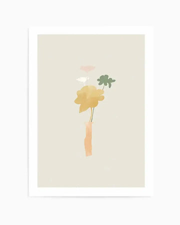 Watercolour art print featuring a minimalist composition of five abstract flowers in soft pastel tones on a warm cream background, printed on fine art paper and displayed in a white frame. The central flower is a large golden yellow bloom with a long stem in a peach-coloured vase, flanked by smaller white and pale pink flowers, and a dark green clover-like bloom.