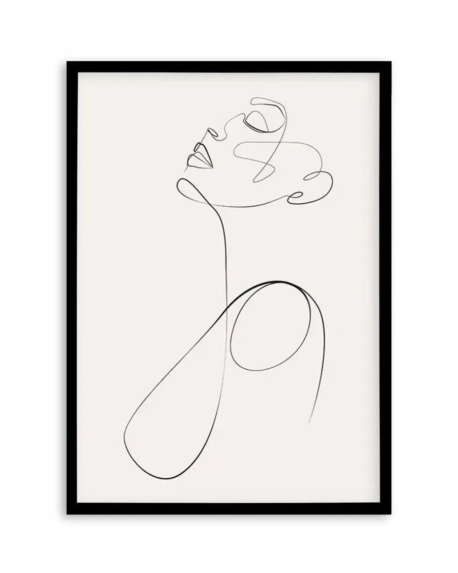 Line art print featuring a single continuous black line forming the profile of a woman's face looking upwards, with a flowing, abstract shape around her head, printed on fine art paper and displayed in a black frame with white border.