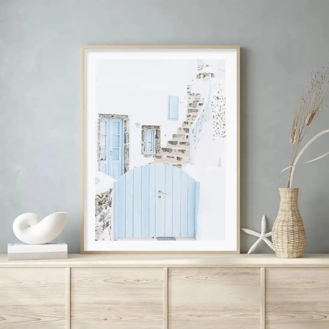Little Blue Gate | Santorini Art Print-Shop Greece Wall Art Prints Online with Olive et Oriel - Our collection of Greek Islands art prints offer unique wall art including blue domes of Santorini in Oia, mediterranean sea prints and incredible posters from Milos and other Greece landscape photography - this collection will add mediterranean blue to your home, perfect for updating the walls in coastal, beach house style. There is Greece art on canvas and extra large wall art with fast, free shippi