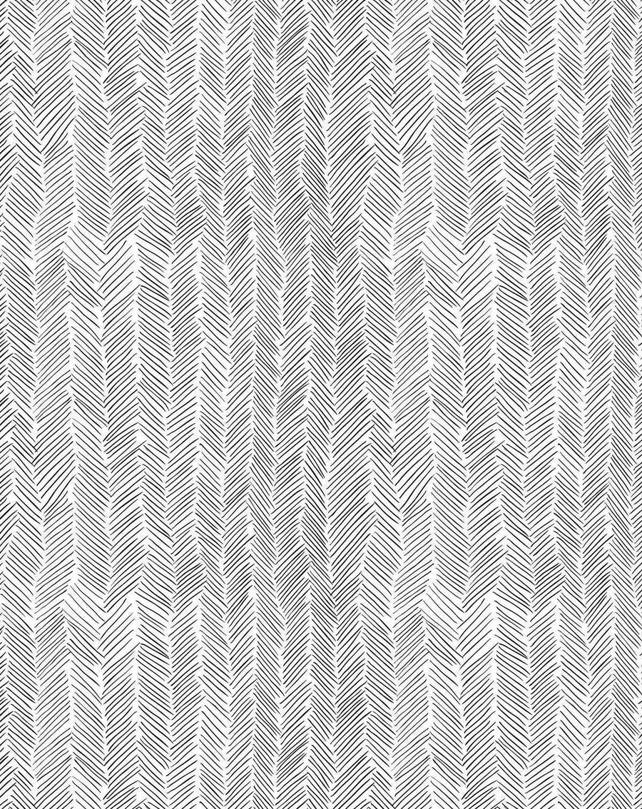 Peel and stick wallpaper featuring a repeating pattern of hand-drawn herringbone lines in black on a white background. The lines are short, slightly irregular, and create a textured, organic feel.