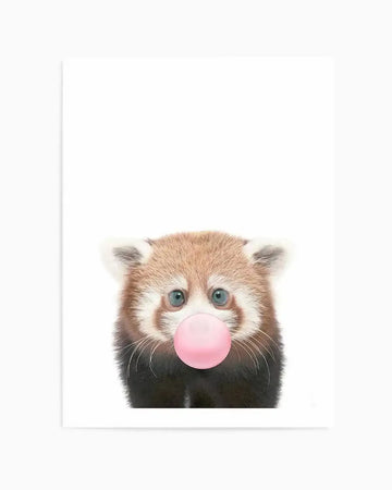 "Photography art print featuring a baby red panda with bright blue eyes, blowing a large bubblegum pink bubble, against a clean white background. The red panda has soft, fluffy fur in shades of reddish-brown, white, and black, with delicate whiskers visible."