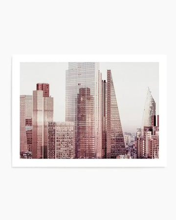 Photography art print of the London city skyline with a soft, muted pink and white colour palette. The composition features several modern skyscrapers with glass facades, including the "Walkie Talkie" building and the "Cheesegrater," under a bright, hazy sky.