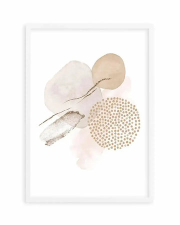 Abstract art print featuring organic shapes and brushstrokes in soft blush pink, cream, and warm beige, with a circular cluster of small gold dots and delicate gold line details, displayed in a white frame with white border.