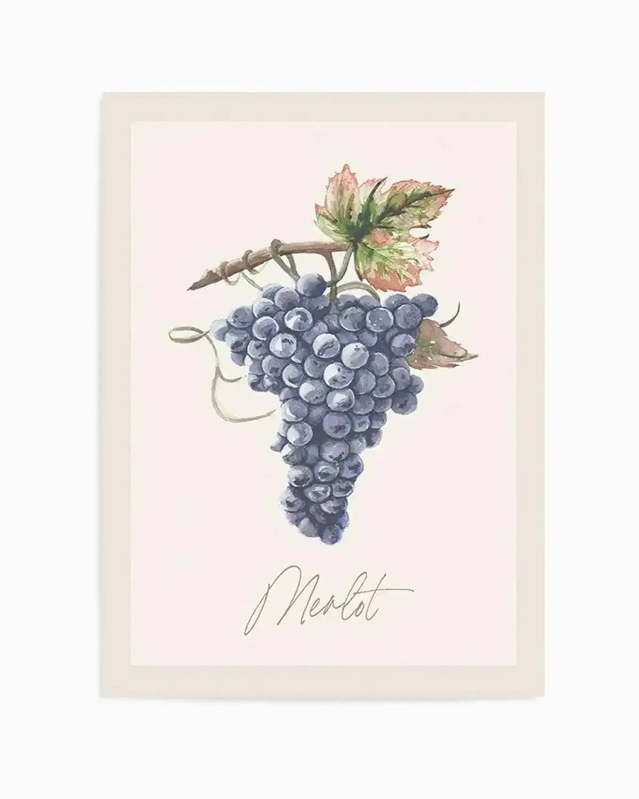 Watercolour art print featuring a bunch of deep purple Merlot grapes with a gnarled brown vine and green and reddish-brown leaves, on a pale pink background. The word "Merlot" is written in elegant script below the grapes. The print has a narrow cream border.