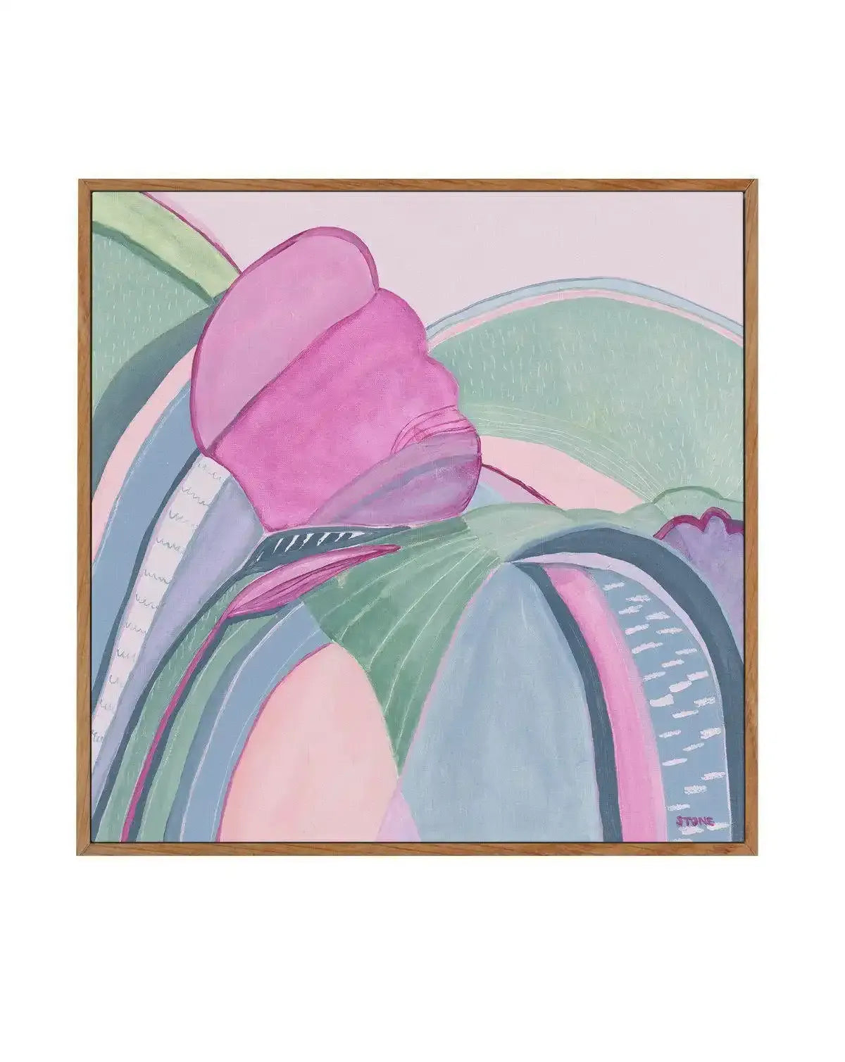 Abstract canvas art print featuring a large, stylized pink flower or bloom with soft, rounded petals dominating the left side of the composition, set against a background of rolling hills and abstract shapes in shades of pale green, light blue, and soft pink. The artwork has a painted, graphic quality with visible brushstrokes and a light, airy mood, displayed in a natural oak frame.